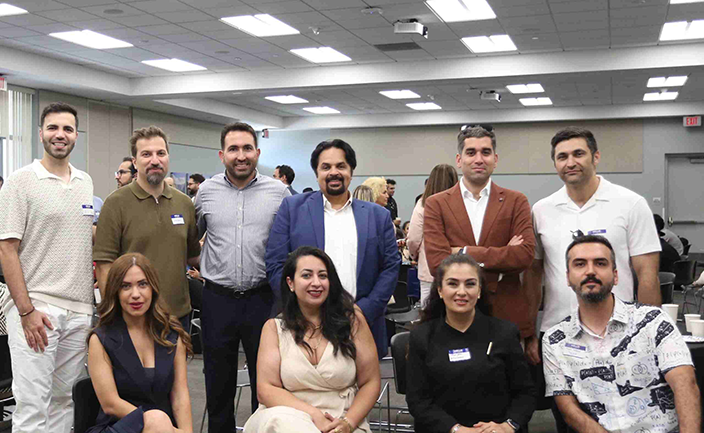 a group of people posing for a photo janus janus innovation hub